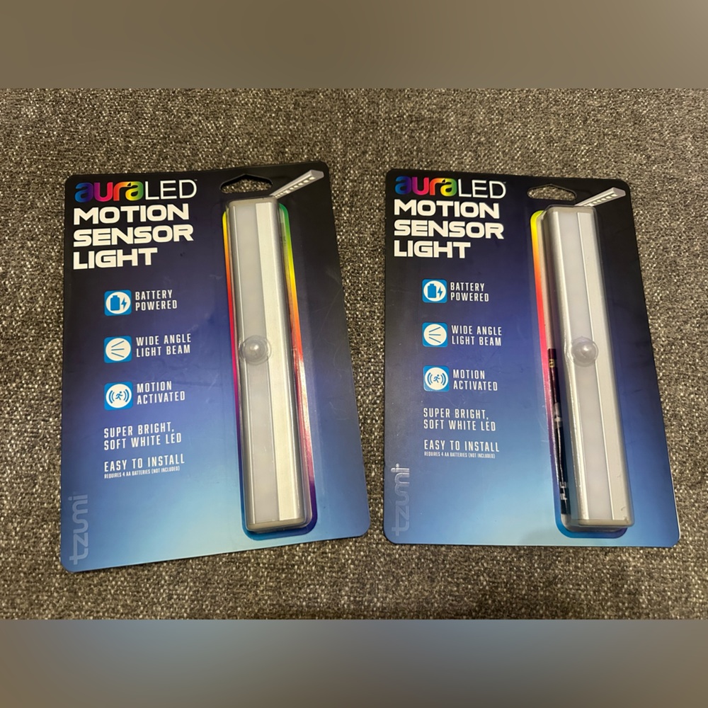 Lot Of 2 Aura LED Motion Sensor Lights 
New In Package